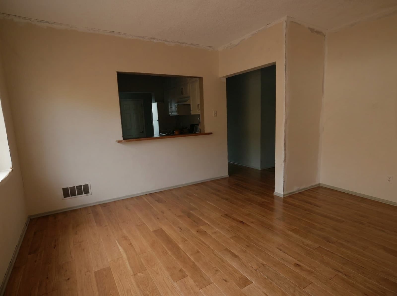 Same dining area with newly installed engineered hardwood