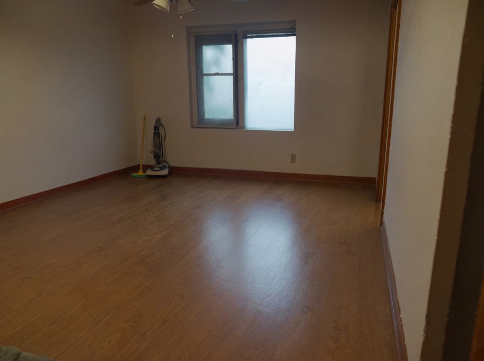 Same bedroom refinished in a modern warm neutral stain